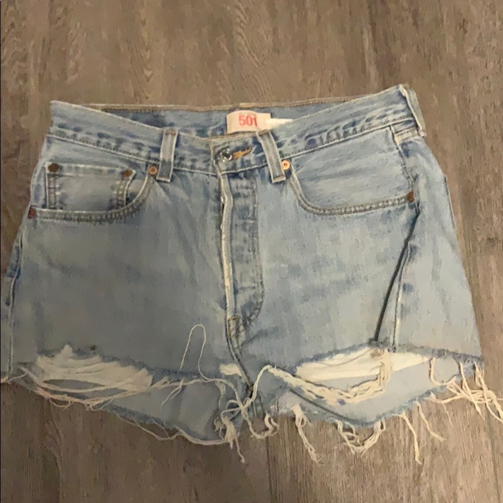 Levi’s 501 distressed high waisted shorts